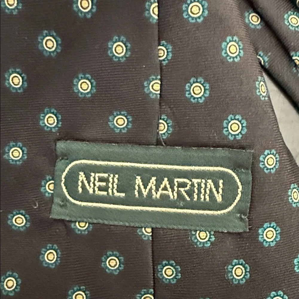 NEIL MARTI. 100% Silk tie Black and Blue Patterned